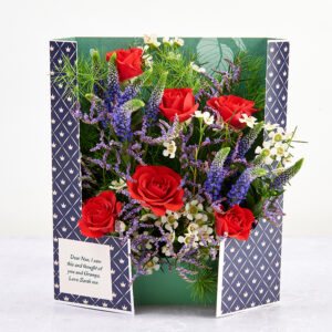 King Charles' Coronation Celebration Flowercard with Red Roses, Veronica Spears, Limonium Feathers, Waxflower and Tree Fern